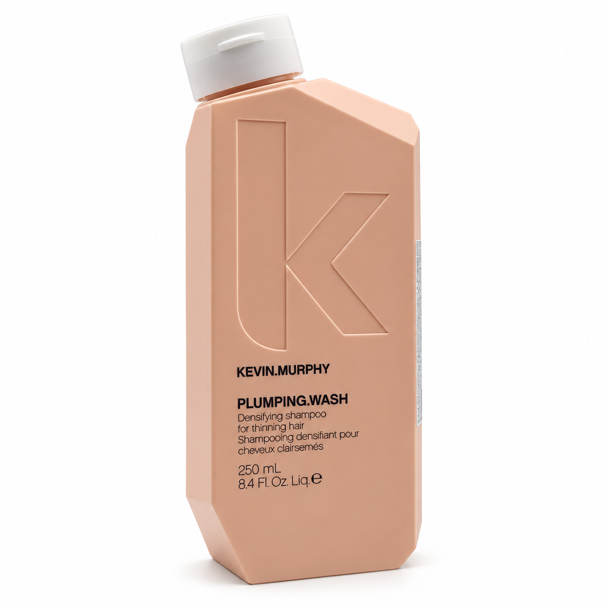 Kevin Murphy Plumping Wash shaming hair in a faceted peach-colored bottle with a white cap, shown on a white background.

KEVIN.MURPHY ケビンマーフィー プランピング ウォッシュ 250ml シャンプー